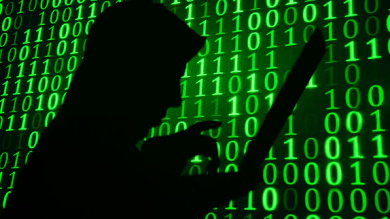 Silhouette of a computer hacker