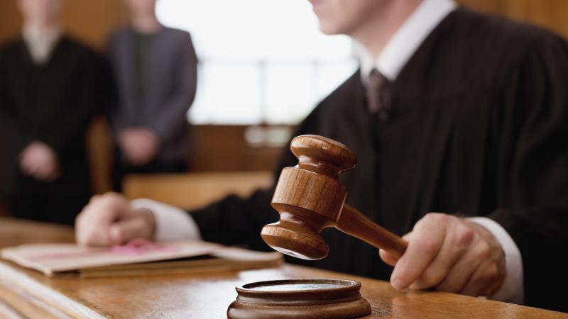 Judge presides over courtroom case 